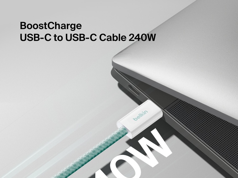 Close-up image of the Belkin BoostCharge USB-C to USB-C Cable 240W connected to a laptop, showcasing its durable braided design and high-speed charging capability.