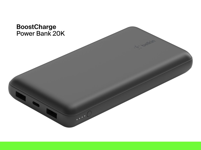 A black Belkin BoostCharge Power Bank 20K with dual USB-A ports, a USB-C port, LED battery indicator lights, and a power button is shown on a white background.