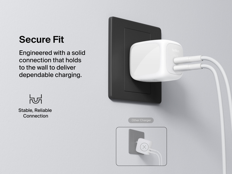 Belkin BoostCharge Pro Dual USB-C GaN Wall Charger 67W shown plugged into an outlet, demonstrating a secure, stable connection for reliable wall charging performance.