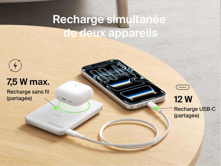 Belkin BoostCharge Slim Magnetic Power Bank 5K with Qi2 charging two devices simultaneously using magnetic wireless charging and USB-C wired output for shared power.