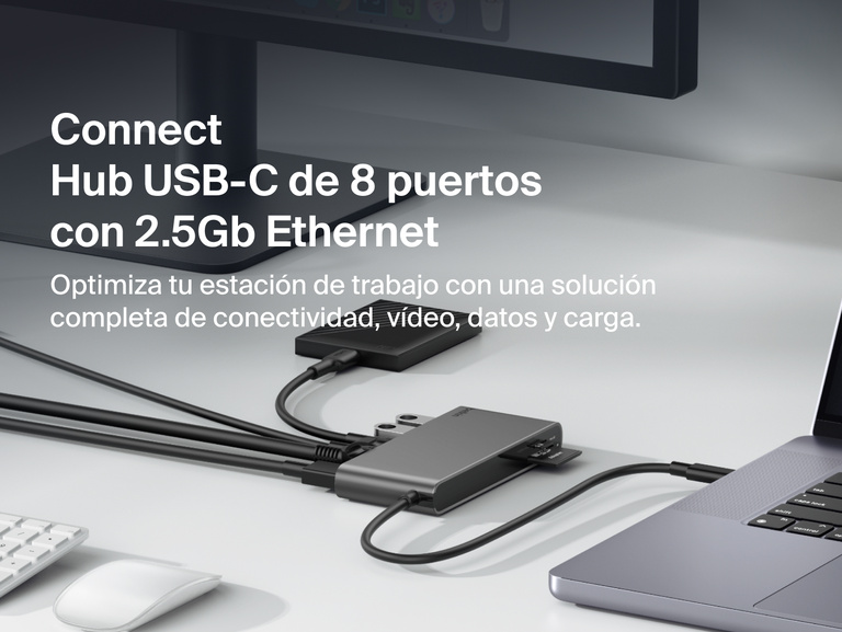 Se muestra el hub USB-C de 8 puertos con 2.5Gb Ethernet de Belkin proporcionando conectividad entre un portátil y un monitor, transferencias de datos de alta velocidad, extensión de pantalla y carga de dispositivos para optimizar el equipamiento y la funcionalidad de cualquier estación de trabajo.