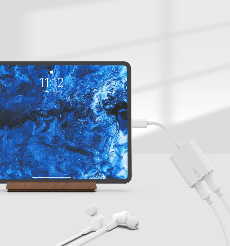 Listen to music and charge your device with Belkin RockStar USB-C Audio + Charge Adapter.