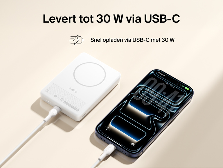 Slim Magnetic Power Bank 10K with Qi2 connected via USB-C cable delivering fast charging to smartphone