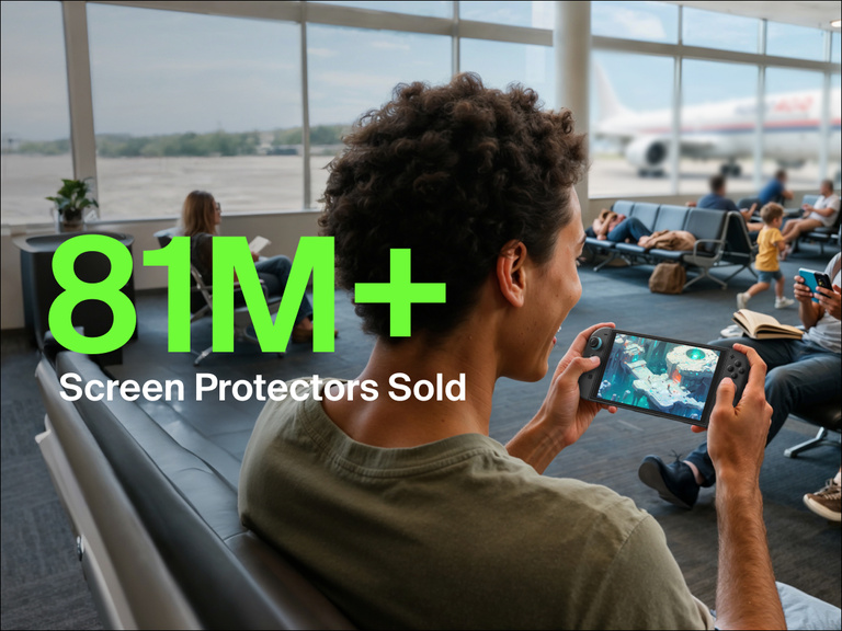 A young person smiles while playing a game on a Nintendo Switch 2 at an airport gate area. In the background, other travelers are seated, reading or using their phones, and a plane is visible through the window. Large green text in the foreground reads “81M+,” and white text below states “Screen Protectors Sold,” highlighting the popularity of the product.