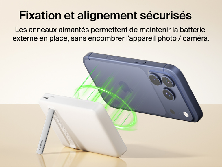 Slim Magnetic Power Bank 10K with Qi2 wirelessly charging smartphone on kickstand with power output indicators