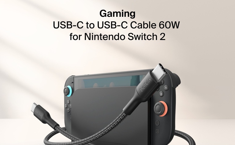 Belkin Gaming USB-C to USB-C Cable 60W is shown connected to a Nintendo Switch 2, offering fast, durable charging with braided construction for gaming-ready performance.