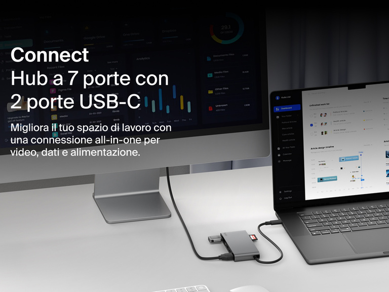 Belkin Connect 7-Port USB-C Hub with Dual USB-C Ports connected to a laptop and monitor on a desk setup.
