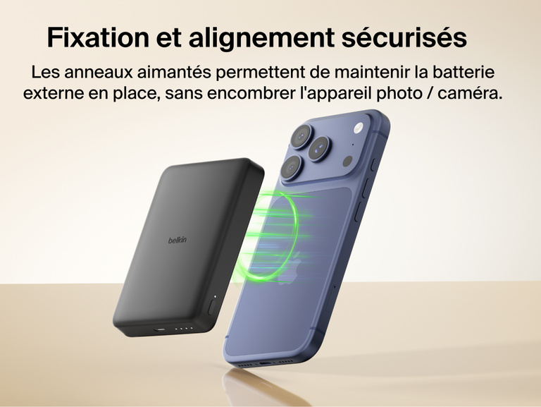 Belkin BoostCharge Slim Magnetic Power Bank 10K magnetically aligning to a smartphone for secure hold and wireless charging without blocking the camera