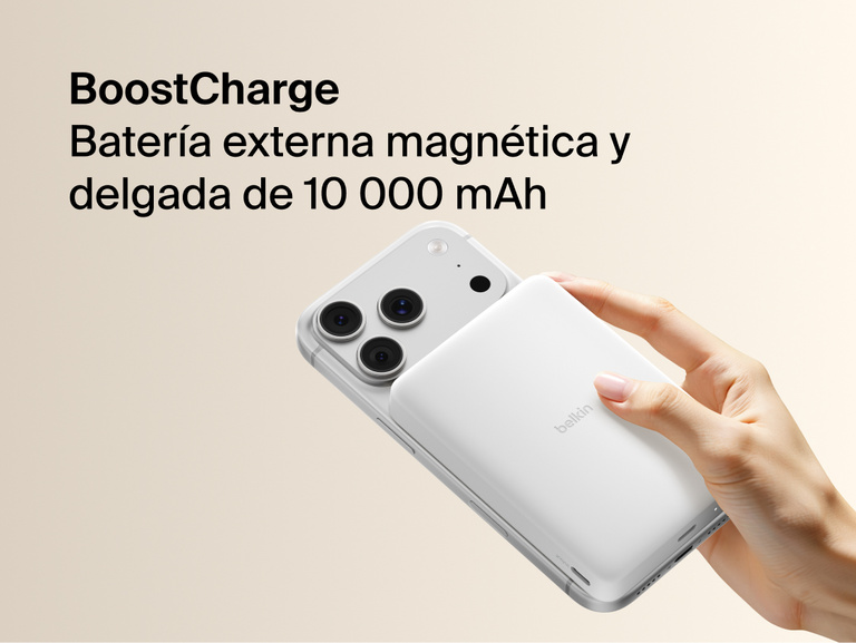 Belkin BoostCharge Slim Magnetic Power Bank 10K magnetically attached to iPhone, demonstrating secure wireless charging with a slim portable design