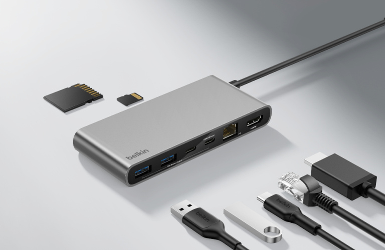 Belkin Connect 8-Port USB-C Hub with 2.5Gb Ethernet shown with multiple compatible connectors and memory cards for expanded device connectivity.