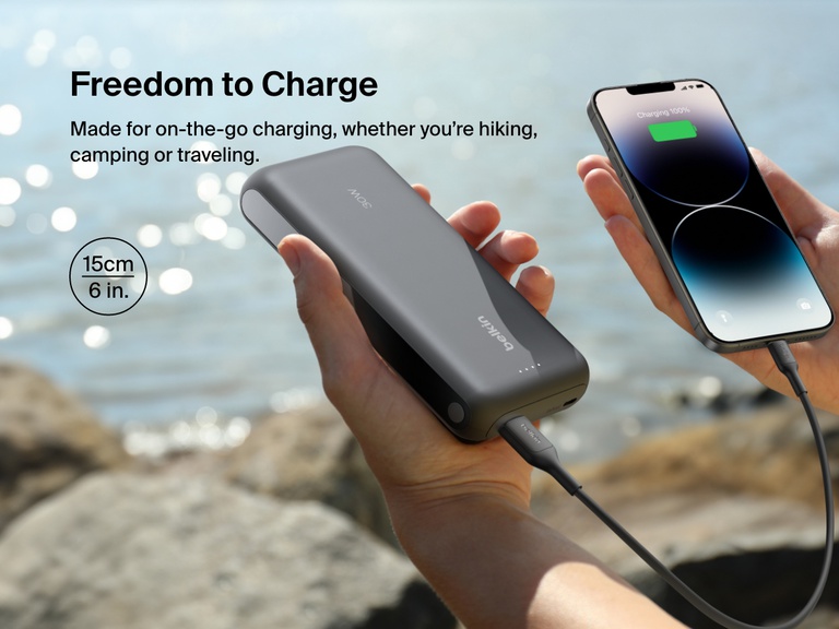 Belkin BoostCharge USB-C to USB-C Cable 240W in a car setup with a 1.5m length, enabling easy device access and seamless Apple CarPlay and Android Auto connectivity while charging.