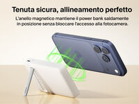 Slim Magnetic Power Bank 10K with Qi2 wirelessly charging smartphone on kickstand with power output indicators