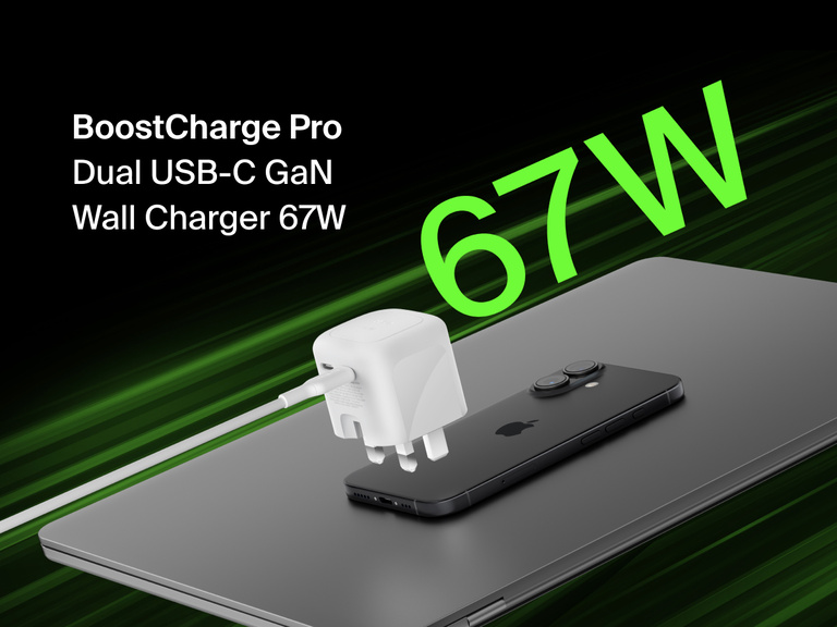 Belkin BoostCharge Pro Dual USB-C GaN Wall Charger 67W shown powering a device, highlighting fast, efficient charging performance.