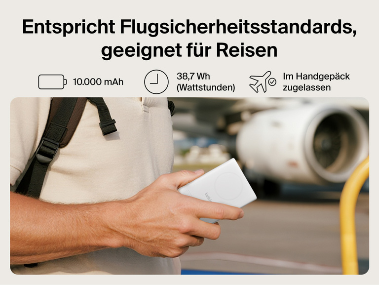 Belkin UltraCharge Pro Power Bank 10K with magnetic ring shown in hand at an airport, highlighting TSA-compliant 10,000 mAh capacity for travel-ready portable charging.