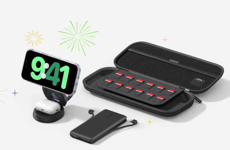 Belkin wireless charging stand displaying a smartphone in StandBy mode alongside a portable power bank and organized Nintendo Switch 2 travel case, styled with festive New Year graphics.