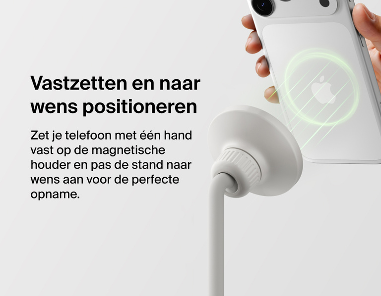 Image showing Belkin Stage Creator Kit magnetic mount attaching an iPhone with one hand, allowing easy snap-in setup and adjustable angles for optimal video recording.