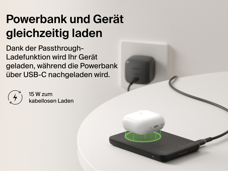Belkin BoostCharge Slim Magnetic Power Bank 5K with Qi2 demonstrating pass-through charging, wirelessly powering a device while the power bank recharges via USB-C.