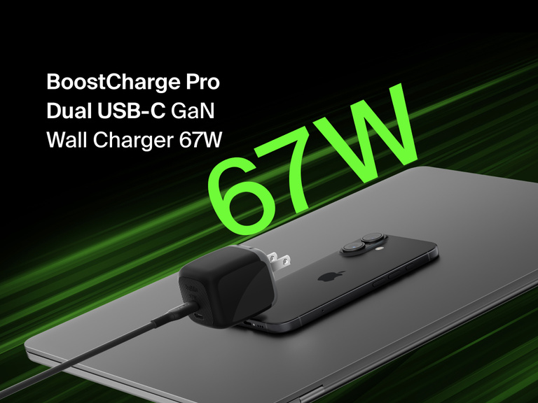 Belkin BoostCharge Pro Dual USB-C GaN Wall Charger 67W shown powering a device, highlighting fast, efficient charging performance.