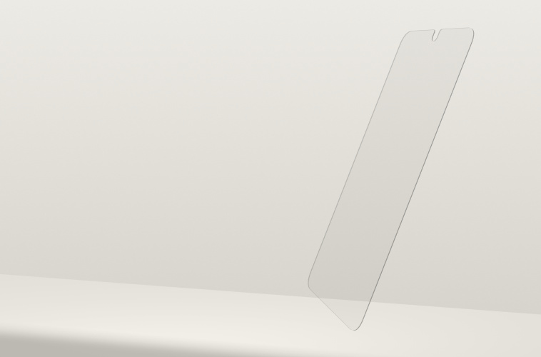 Transparent InvisiGlass treated screen protector with rounded edges and a top notch, displayed at an angle against a neutral background to highlight its thin, sleek design.