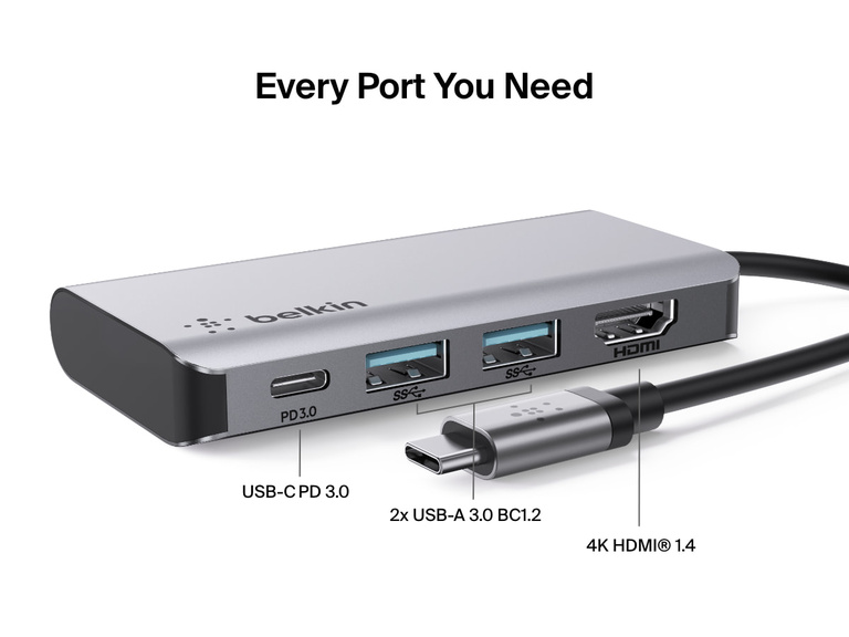 Close-up view of the Belkin Connect USB-C 4-in-1 Multiport Adapter showing labeled ports for USB-C PD 3.0, two USB-A 3.0 BC1.2, and 4K HDMI 1.4 connectivity.