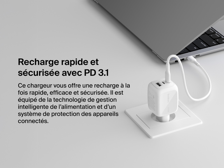 BoostCharge Pro 3-Port GaN Wall Charger 70W connected to a laptop, showcasing USB-C PD 3.1 technology for fast, efficient, and safe charging with advanced power management.