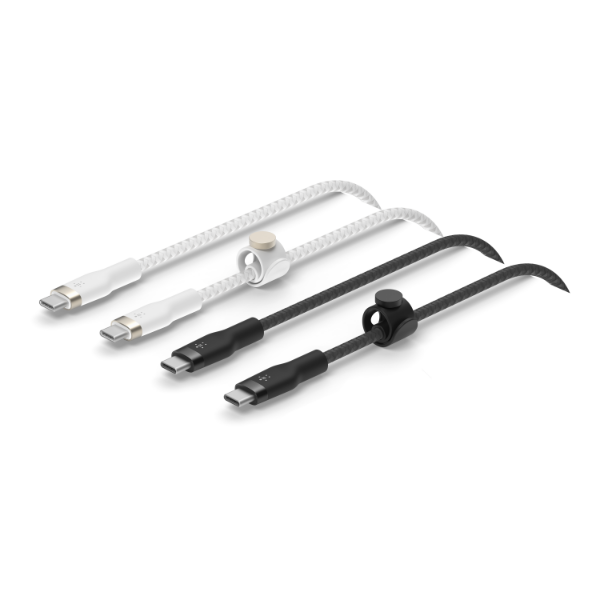 A set of four Belkin braided charging cables, featuring two black and two white variants. The cables include combinations of USB-C to USB-C and USB-C to Lightning connectors. Each cable comes with a color-matching magnetic cable management clip.