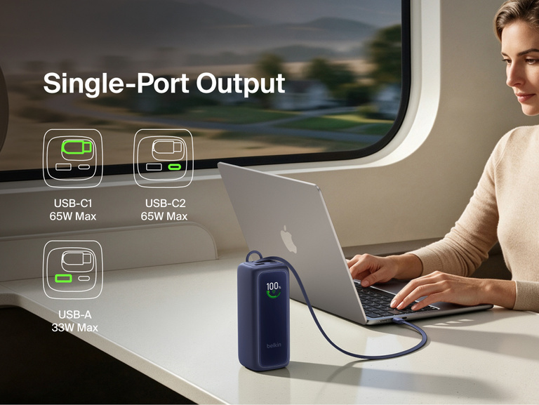 UltraCharge Power Bank 22K with Retractable Cable charging a laptop from a single port on a train tray table, with icons showing USB-C1, USB-C2, and USB-A single-port output wattages