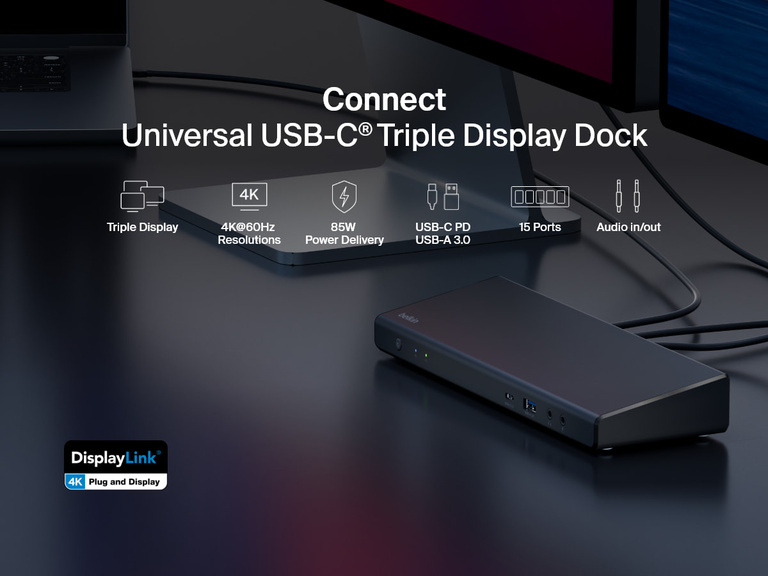 Belkin Connect Universal USB-C Triple Display Dock shown on a desk setup, highlighting features including triple display support, 4K@60Hz resolution, 85W power delivery, USB-C PD and USB-A 3.0 ports, 15 total ports, and audio in/out connectivity.