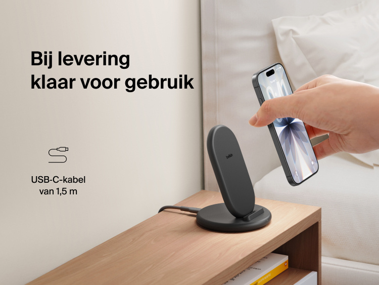 Belkin BoostCharge Wireless Charging Stand 15W shown alongside Belkin’s sustainability commitment graphic highlighting renewable energy progress toward 100% by 2030.