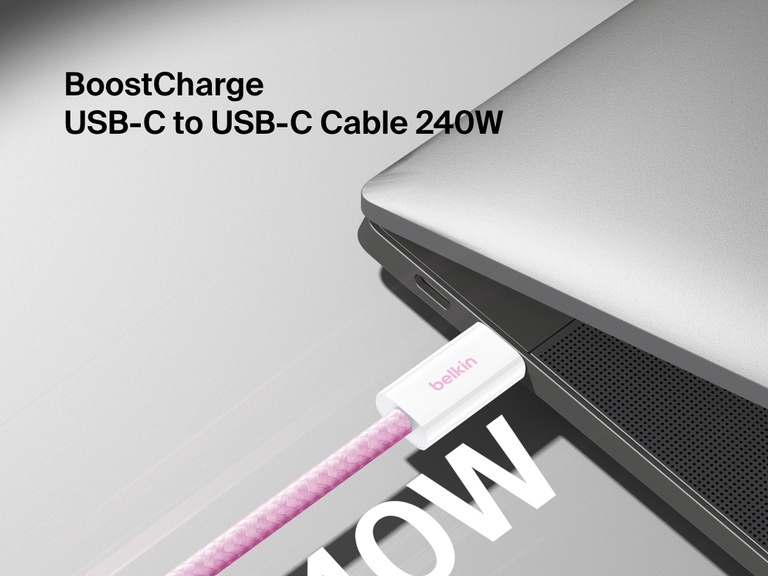Close-up image of the Belkin BoostCharge USB-C to USB-C Cable 240W connected to a laptop, showcasing its durable braided design and high-speed charging capability.