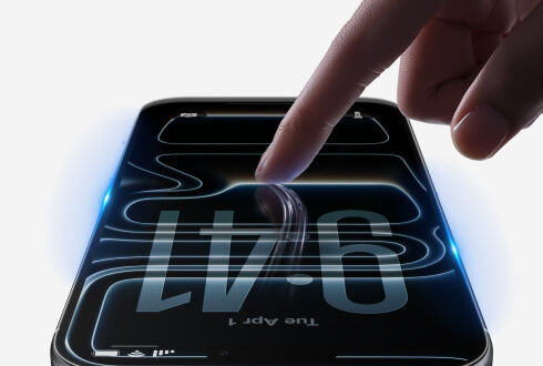 Finger touching a smartphone screen with a tempered glass screen protector, showing smooth touch response. Finger touching a smartphone screen with a tempered glass screen protector, showing smooth touch response.