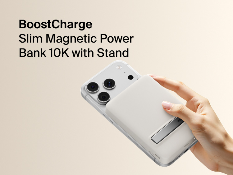 Slim Magnetic Power Bank 10K with Qi2 magnetically attached to smartphone showing integrated kickstand and handheld use