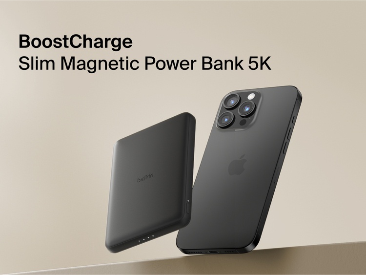 Belkin BoostCharge Slim Magnetic Power Bank 5K shown magnetically attached to a smartphone beside a slim wallet accessory, highlighting its compact portable charging design.