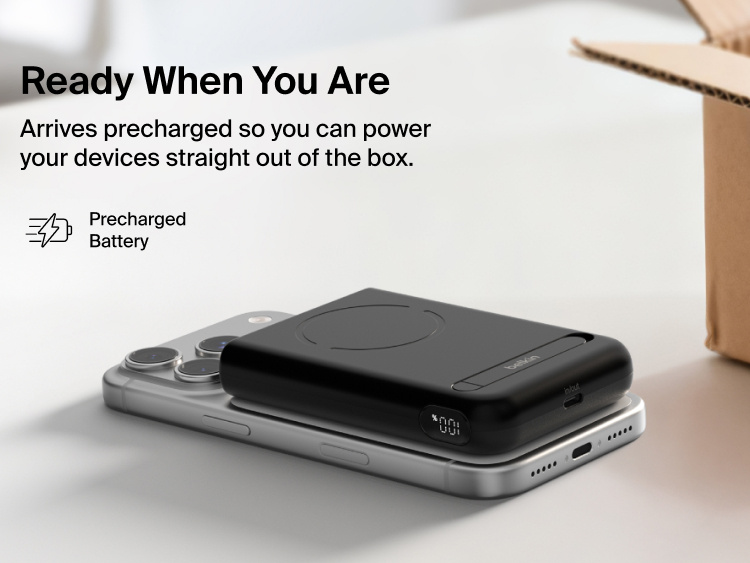 Belkin UltraCharge Pro Power Bank 10K with magnetic ring shown attached to a smartphone, highlighting a precharged battery and ready-to-use portable wireless charging straight out of the box.
