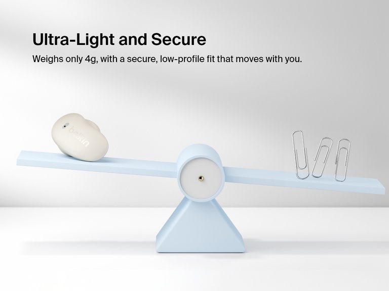 Belkin SoundForm Anywhere Wireless Earbuds shown on a balance scale highlighting ultra-light 4g weight and secure low-profile fit.