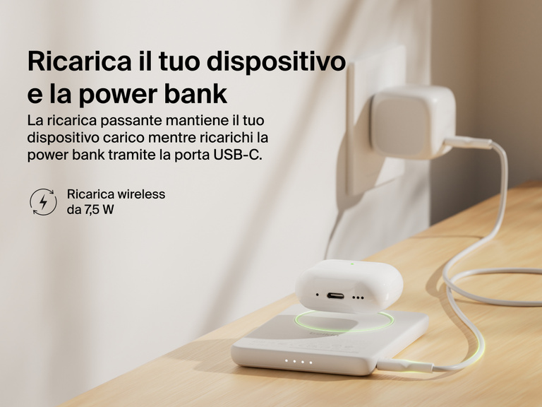 Belkin BoostCharge Slim Magnetic Power Bank 5K shown wirelessly charging earbuds while recharging via USB-C, demonstrating 7.5W pass-through charging functionality.