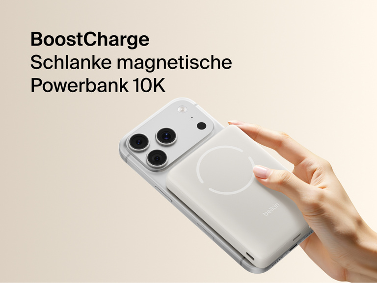 Slim Magnetic Power Bank 10K with Qi2 magnetically attached to smartphone held in hand demonstrating wireless charging alignment