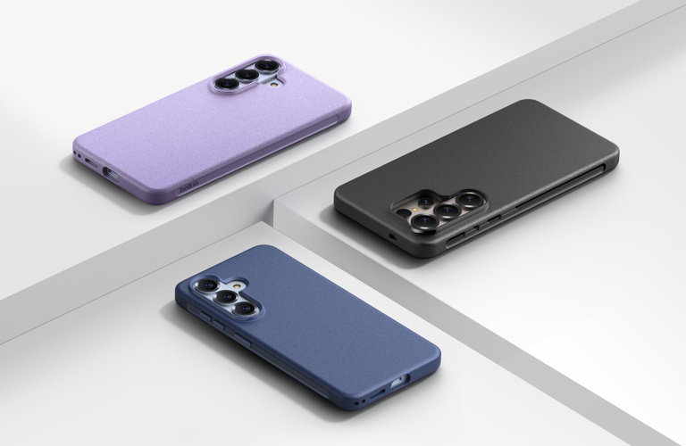 Three Samsung smartphones placed face down in textured protective cases&mdash;purple, black, and blue&mdash;arranged on stepped white platforms to highlight different case colors, finishes, and camera protection.