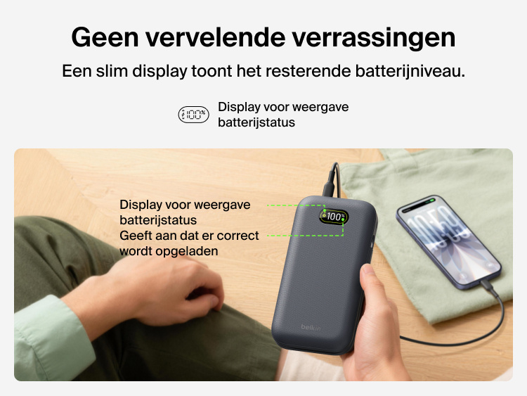 UltraCharge Pro Laptop Power Bank 27K with digital battery percentage display showing real-time power levels while charging a smartphone