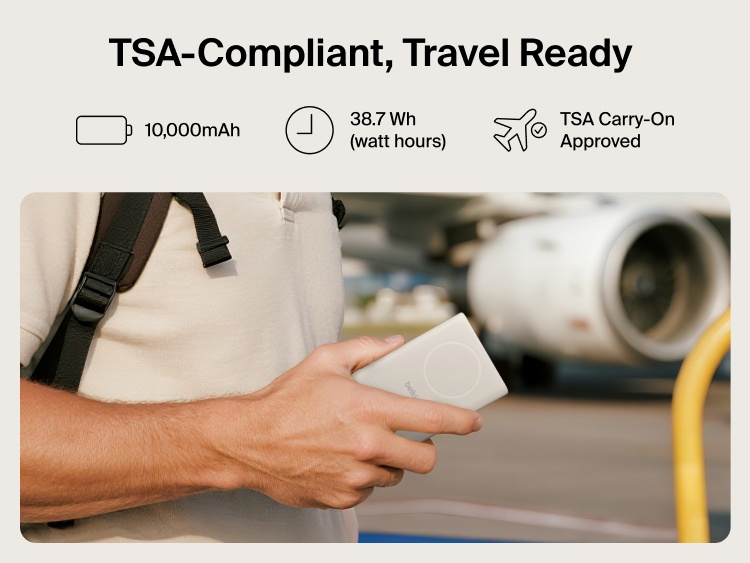 Belkin UltraCharge Pro Power Bank 10K with magnetic ring shown in hand at an airport, highlighting TSA-compliant 10,000 mAh capacity for travel-ready portable charging.