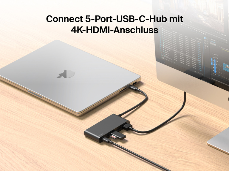 Belkin Connect 5-Port USB-C Hub with 4K HDMI links a MacBook to an external monitor and multiple devices on a wooden desk.