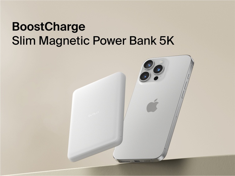 Belkin BoostCharge Slim Magnetic Power Bank 5K shown magnetically attached to a smartphone beside a slim wallet accessory, highlighting its compact portable charging design.