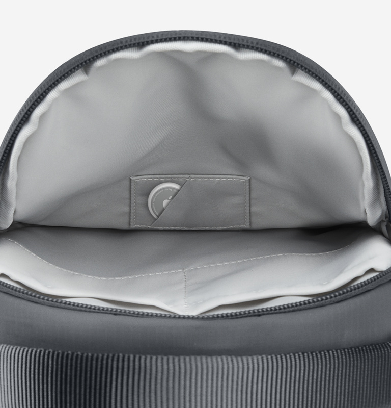An AirTag that is in the compartment of the travel bag for Apple Vision Pro.