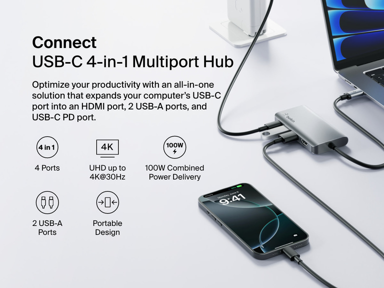 Belkin Connect USB-C 4-in-1 Multiport Adapter is shown connected to a laptop and smartphone, with callouts highlighting its HDMI port, 2 USB-A ports, USB-C PD port, 4K video support, 100W power delivery, and portable design.