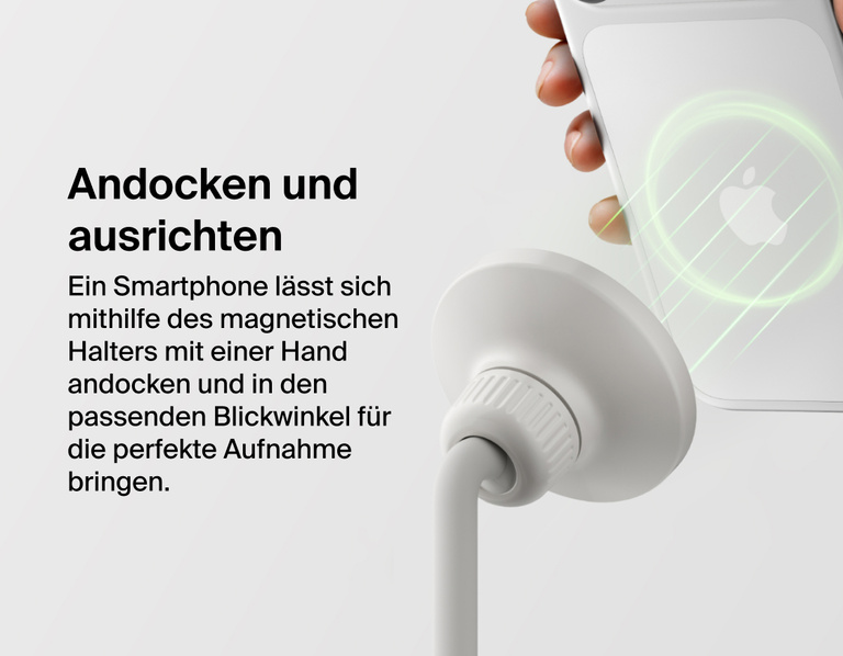 Image showing Belkin Stage Creator Kit magnetic mount attaching an iPhone with one hand, allowing easy snap-in setup and adjustable angles for optimal video recording.