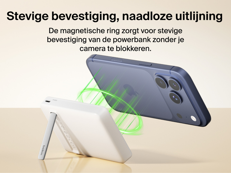 Slim Magnetic Power Bank 10K with Qi2 wirelessly charging smartphone on kickstand with power output indicators