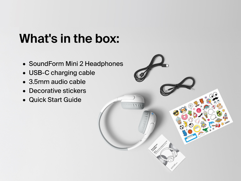 SoundForm Mini 2 Wireless On-Ear Headphones for Kids package contents laid out: headphones, USB-C charging cable, 3.5mm audio cable, decorative sticker sheet, and Quick Start Guide, with a Whats in the box label