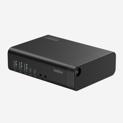 Belkin Universal 16-Port Triple Display USB-C Dock shown at an angled view, featuring multiple USB ports, audio jacks, and a compact design for expanding workstation connectivity.