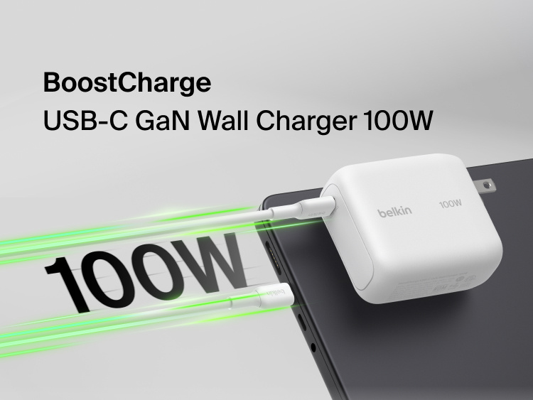 BoostCharge USB-C GaN Wall Charger 100W connected to a USB-C cable with 100W fast charging graphic for laptops, tablets, and smartphones