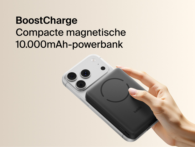 Slim Magnetic Power Bank 10K with Qi2 magnetically attached to smartphone held in hand demonstrating wireless charging alignment